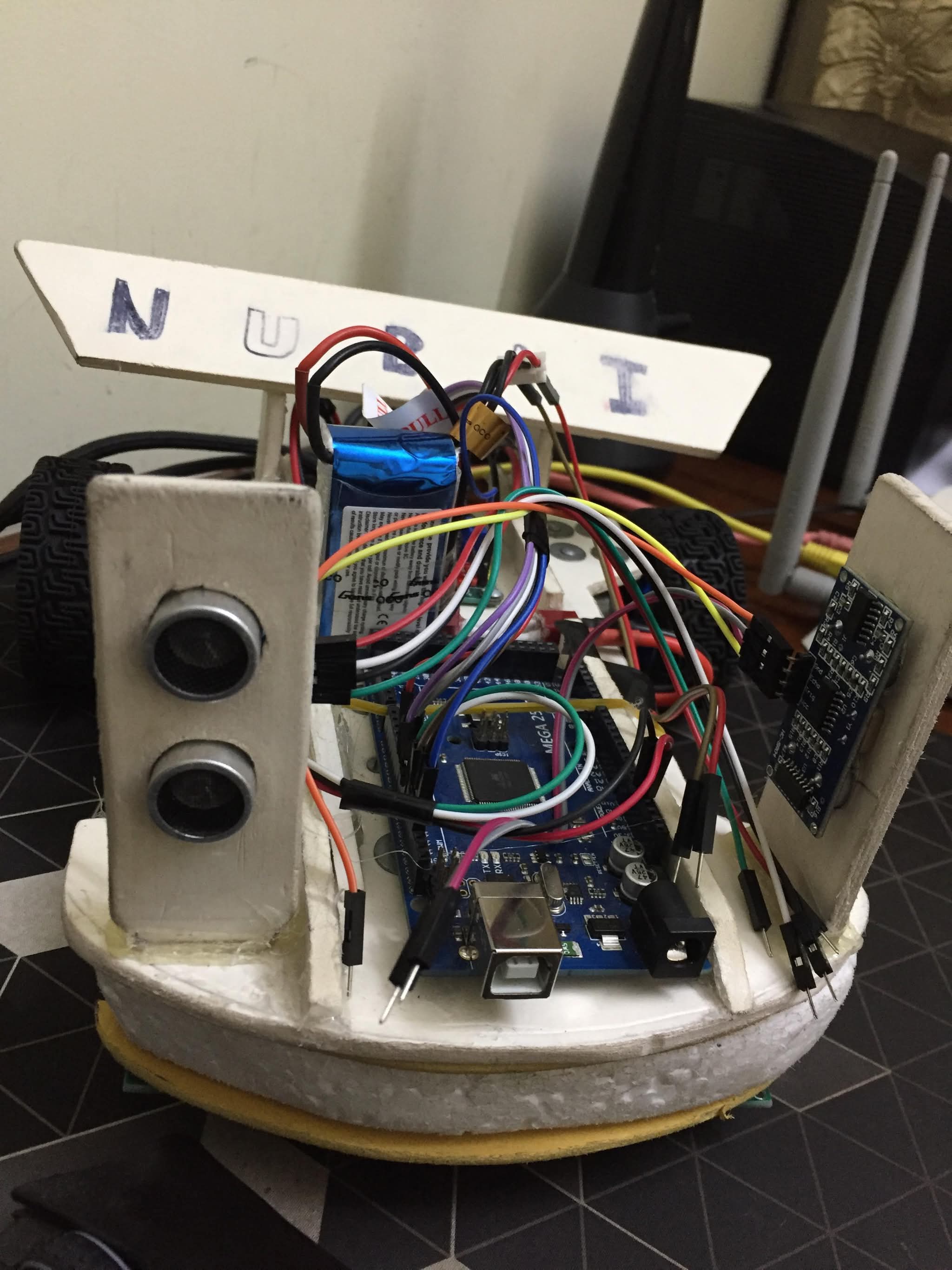 Completed robot, front view with sonar sensor and Arduino